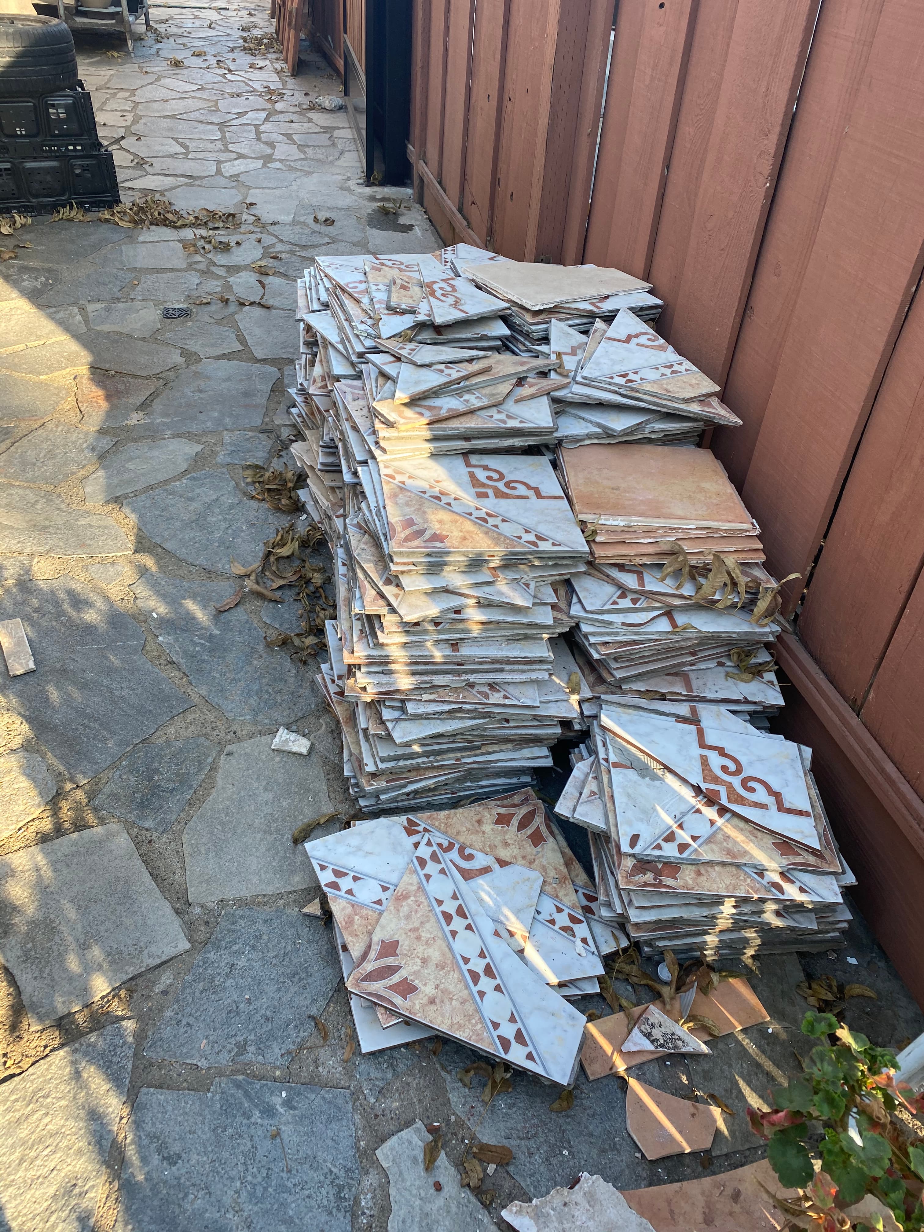Kitchen with old tile floor before removal